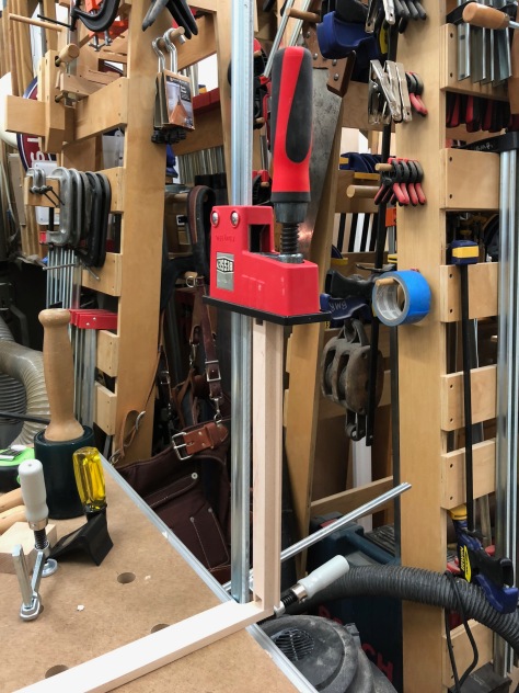 Transferring Pins to a Tail Board by clamping a K-body clamp to the side of your bench